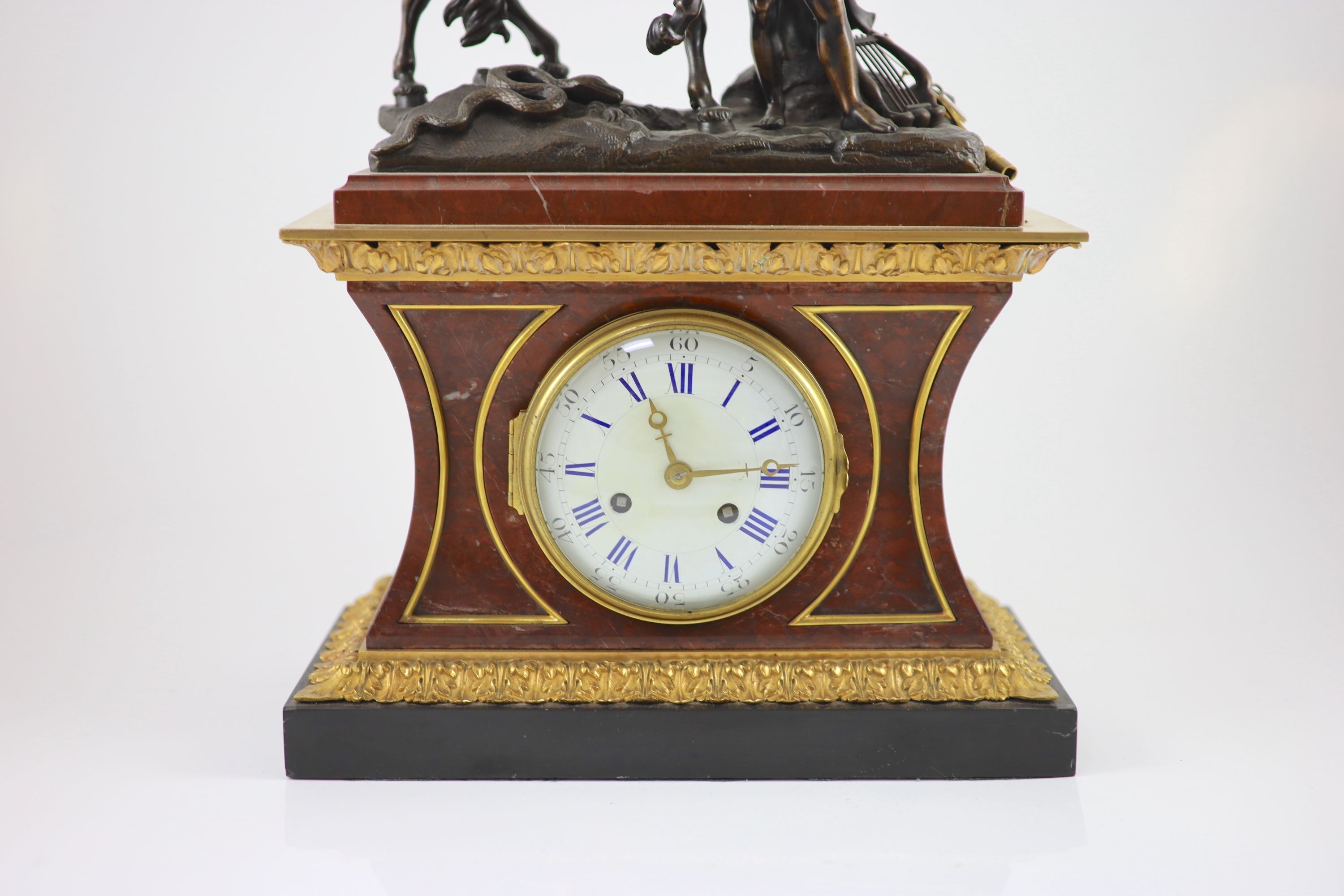 A late 19th century French bronze mounted rouge marble mantel clock, H 53cm. W 34cm.